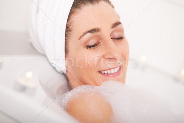 Woman takes bath  Stock photo © Kzenon