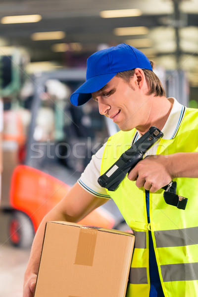 работник пакет склад жилет сканер штрих Сток-фото © Kzenon