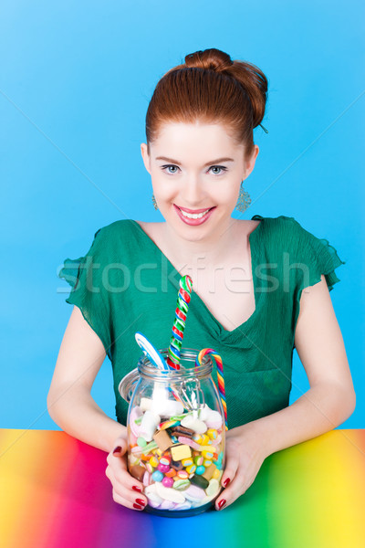 Girl with sweet goodies and candy Stock photo © Kzenon