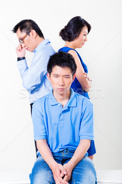 Young Chinese boy suffering from parents divorce Stock photo © Kzenon