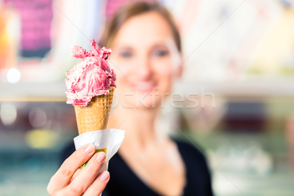 Ice-cream seller serving ice cream Stock photo © Kzenon