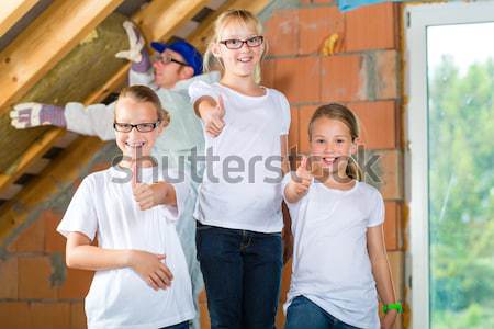 Family on the playground Stock photo © Kzenon