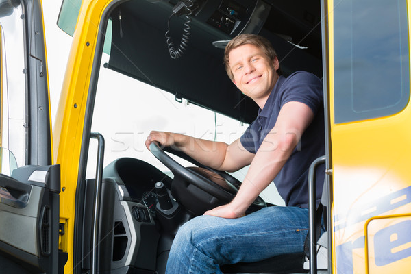 Ciężarówka kierowcy cap logistyka dumny przemysłu Zdjęcia stock © Kzenon