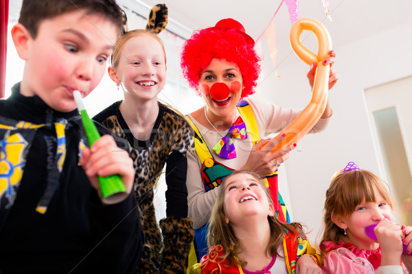 Kids birthday party with clown and lot of noise  Stock photo © Kzenon