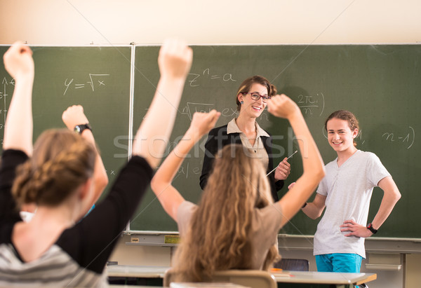 Math teacher standing in front of students who are well prepared Stock photo © Kzenon