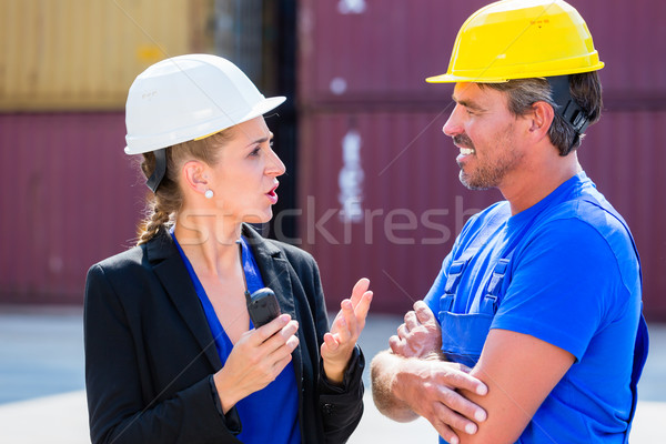 Worker and Manager on container terminal of port Stock photo © Kzenon