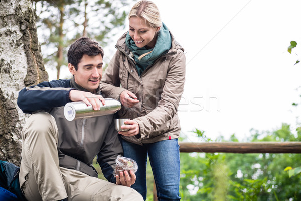 Wanderers found a place to rest under trees Stock photo © Kzenon