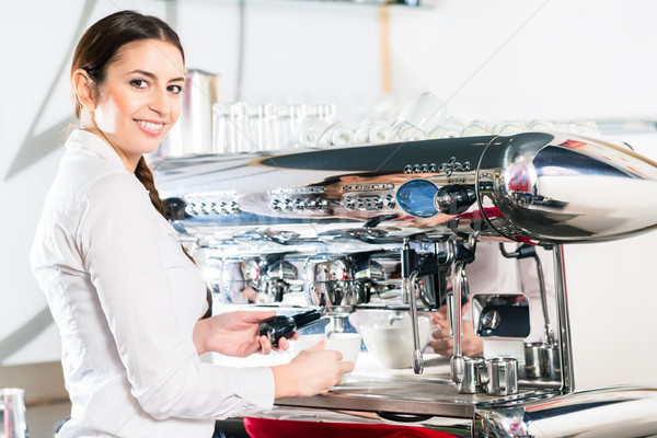 Jeunes serveuse automatique regarder [[stock_photo]] © Kzenon