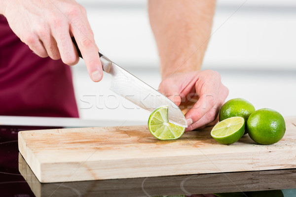 Cutting fruits for cooking Stock photo © Kzenon