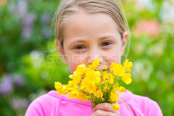 Girl with buttercups in summer Stock photo © Kzenon