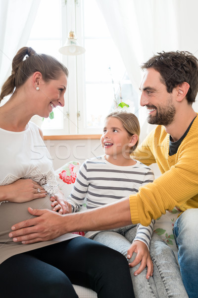 Little family is happy about pregnancy of mother Stock photo © Kzenon