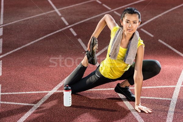 Nő meleg felfelé testmozgás futás stadion Stock fotó © Kzenon
