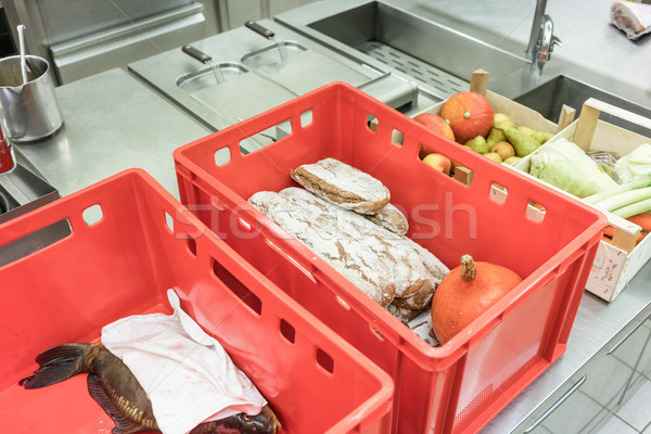 Delivery boxes with fresh food ready for inspection in restaurant Stock photo © Kzenon