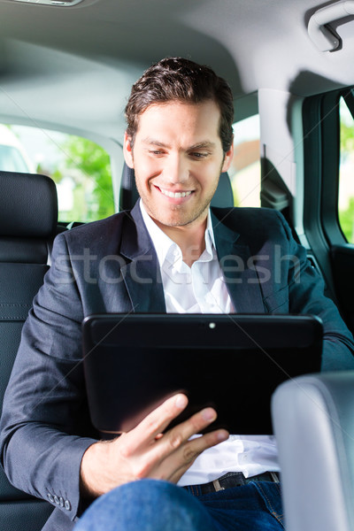 Man traveling in taxi, he has an appointment Stock photo © Kzenon