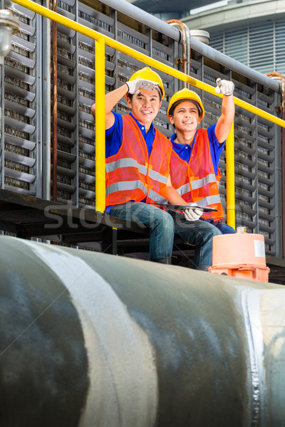 Asian technicians or workers on construction site Stock photo © Kzenon