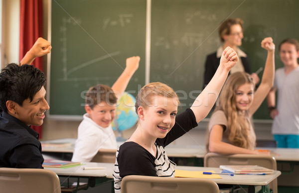 Math teacher standing in front of students who are well prepared Stock photo © Kzenon