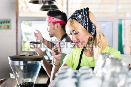 Woman and man in Asian cafe preparing coffee Stock photo © Kzenon