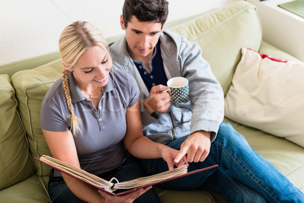 Nostalgique couple souriant regarder ensemble [[stock_photo]] © Kzenon