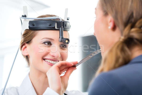 Patient in a examination by doctor in clinic Stock photo © Kzenon