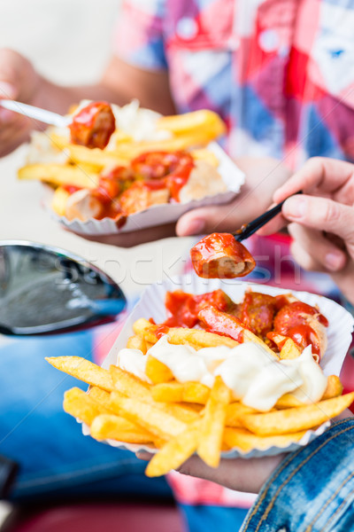 Currywurst and french fries on scooter Stock photo © Kzenon