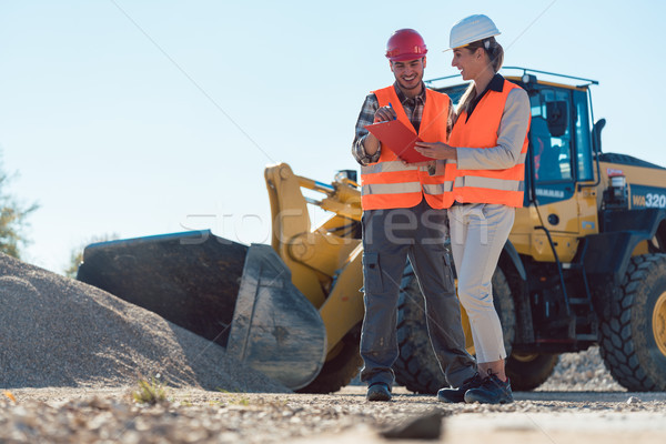 Man and woman worker on construction site Stock photo © Kzenon