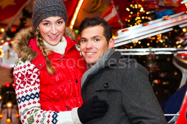 Couple during  the Christmas market or advent season Stock photo © Kzenon