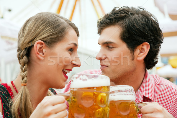 Couple in a beer tent Stock photo © Kzenon