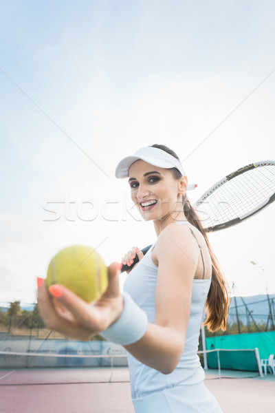 Woman wanting to play Tennis Stock photo © Kzenon