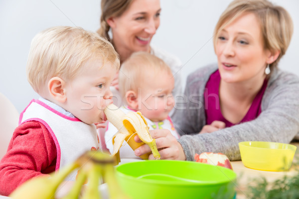 Portrait of a cute and healthy baby girl with blue eyes Stock photo © Kzenon