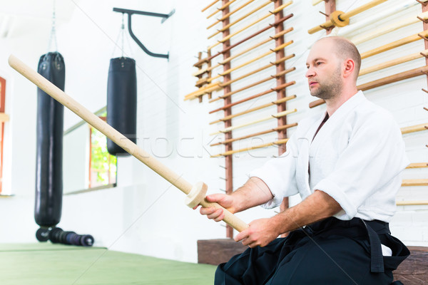 Mann Aikido Kampfkünste Holz Schwert Schule Stock foto © Kzenon