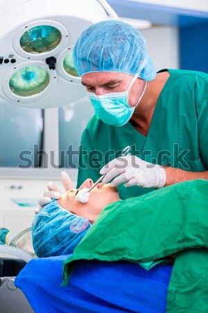 Stock photo: Surgeon in operating room with anesthetic mask