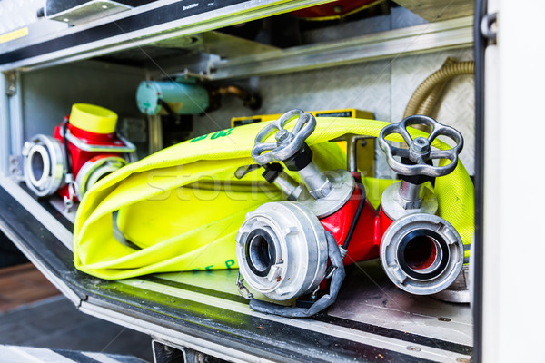 Hoses in vehicle of german fire brigade Stock photo © Kzenon