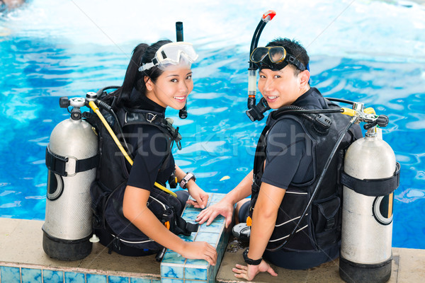 Stock photo: Teacher and student in a diving school
