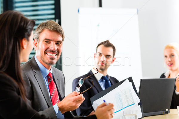 Business - businesspeople have team meeting Stock photo © Kzenon