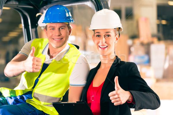 Stock photo: Forklift driver and supervisor at warehouse