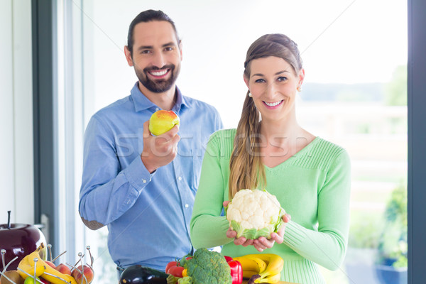 Couple living healthy eating fruits and vegetables Stock photo © Kzenon