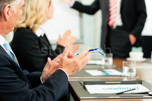 Applause for a presentation in meeting Stock photo © Kzenon