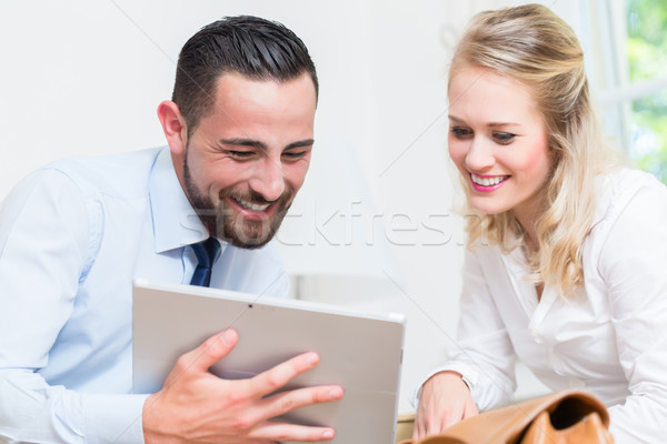 Business woman and man in work meeting Stock photo © Kzenon