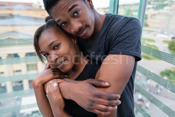 Portrait of young African American couple in love posing togethe Stock photo © Kzenon