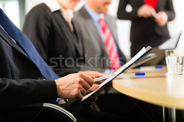 Business - businesspeople, meeting and presentation in office Stock photo © Kzenon