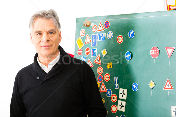 Driving instructor with his class Stock photo © Kzenon