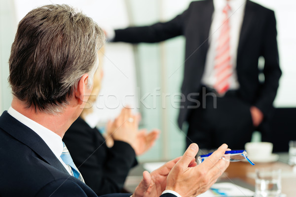 Applause for a presentation in meeting Stock photo © Kzenon