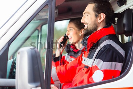 Emergency doctor and paramedic with ambulance   Stock photo © Kzenon