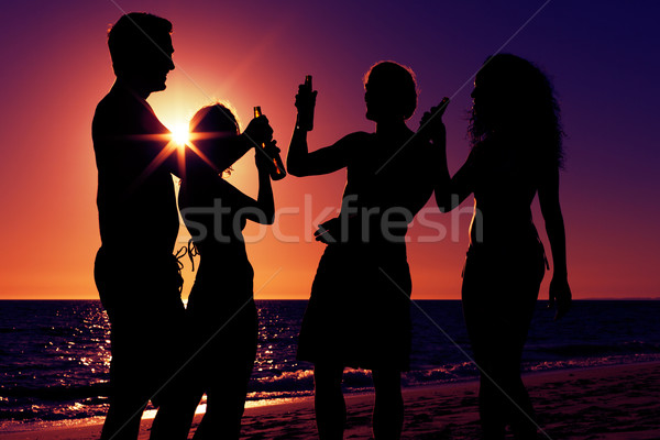 Insanlar parti plaj içecekler iki çiftler Stok fotoğraf © Kzenon
