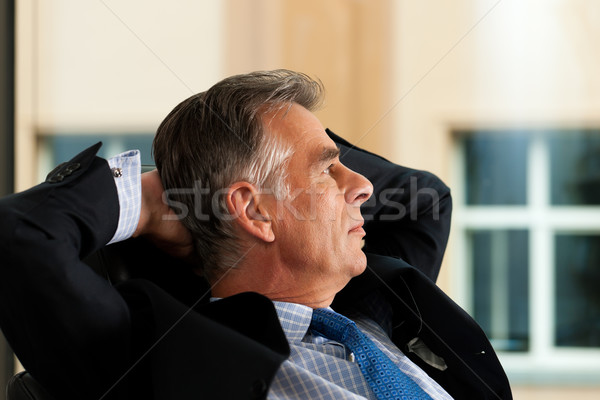Business - Boss contemplating in his office Stock photo © Kzenon