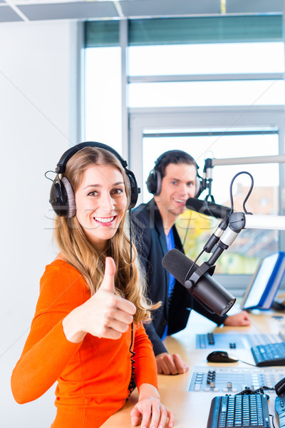 radio presenters in radio station on air Stock photo © Kzenon