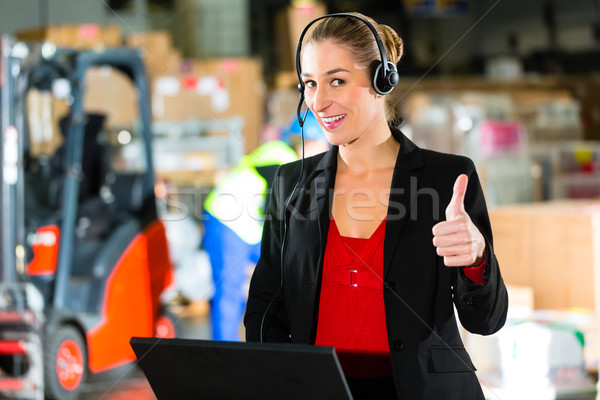 dispatcher using headset at warehouse of forwarding Stock photo © Kzenon