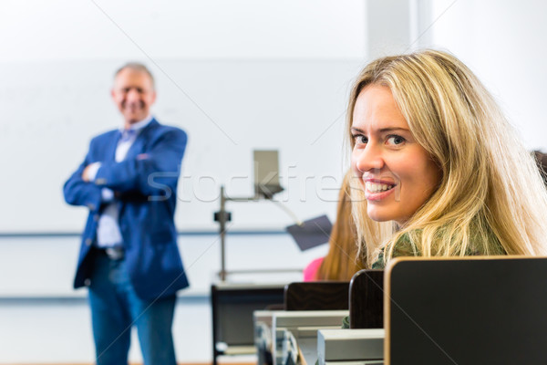 Students learing in college lecture Stock photo © Kzenon