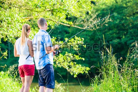 Woman with stand up paddle board sup on river Stock photo © Kzenon