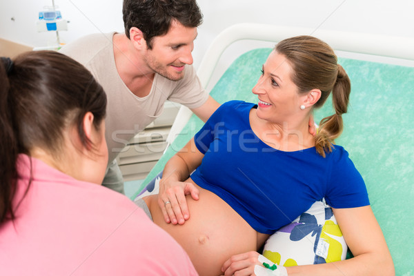 Pregnant woman and her man in delivery room Stock photo © Kzenon